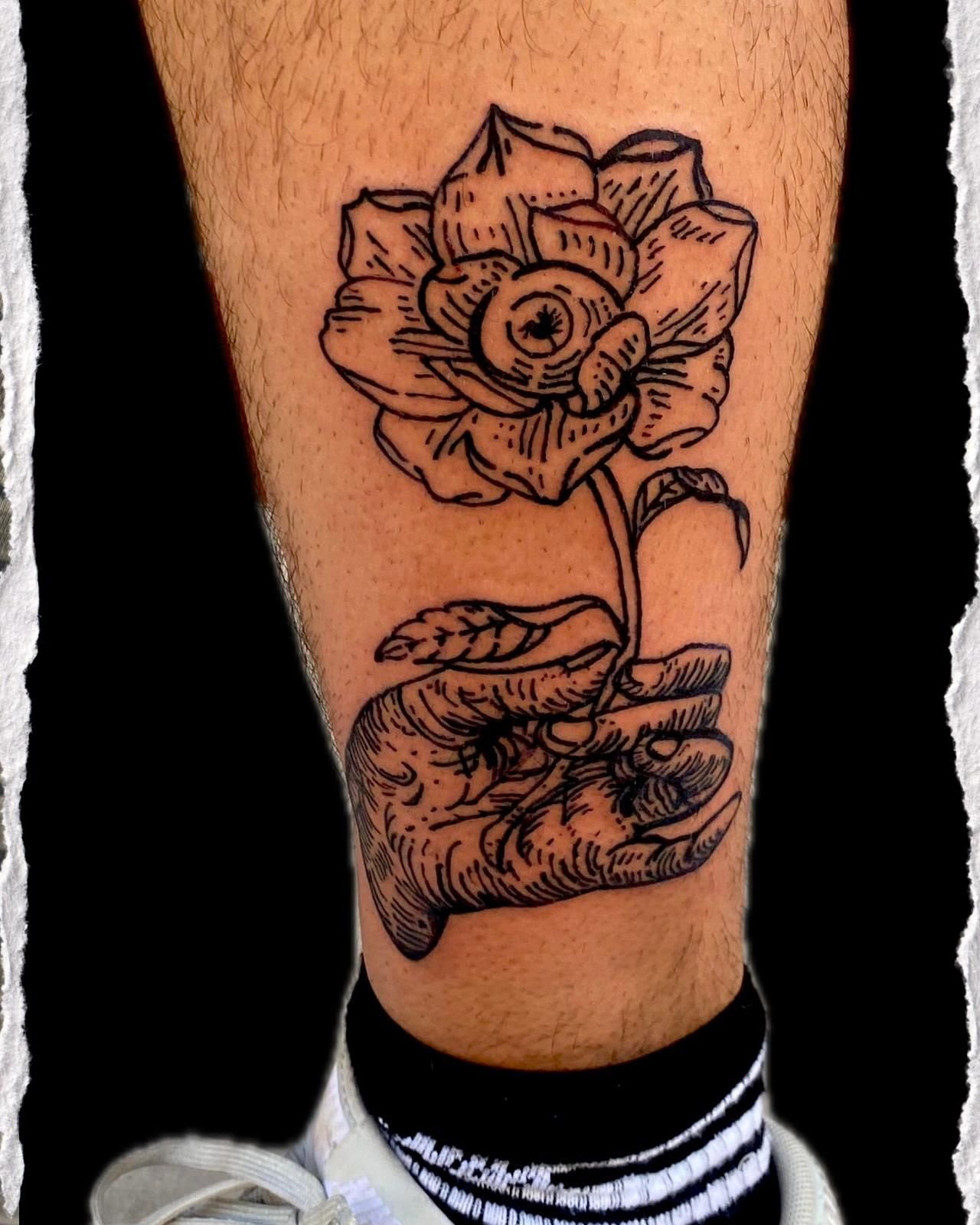 Tatuaje de estilo grabado.